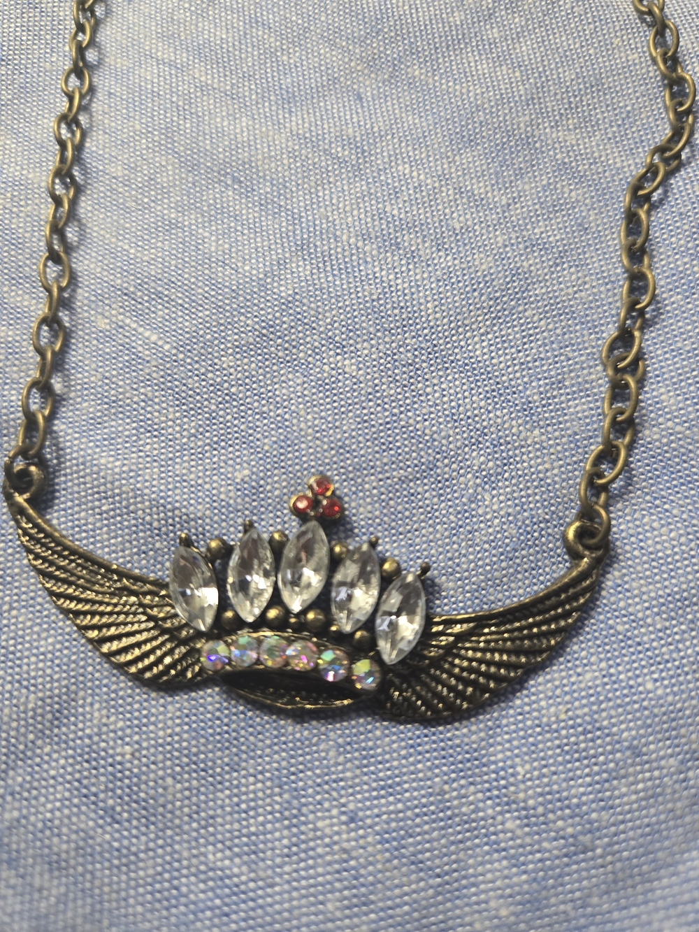 Bronze Winged Crystal Pendant Necklace with Clear and Red Accents